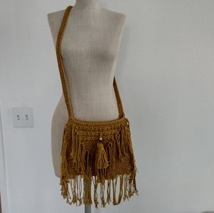 Macrame fringe crossbody bag.